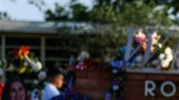 A woman cries at a makeshift memorial at Robb Elementary School in Uvalde, Texas, on May 30, 2022. - Grieving families were to hold the first funerals Tuesday for Texas shooting victims one week after a school massacre left 19 children and two teachers dead, with President Joe Biden vowing to push for stricter US gun regulation.
Mourners attended wakes in the town of Uvalde on Monday for some of the child victims gunned down by a local 18-year-old man who was then killed by police. (Photo by CHANDAN KHANNA / AFP) (Photo by CHANDAN KHANNA/AFP via Getty Images)