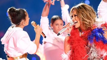 MIAMI, FLORIDA - FEBRUARY 02: (L-R) Emme Maribel Muñiz and Jennifer Lopez perform onstage during the Pepsi Super Bowl LIV Halftime Show at Hard Rock Stadium on February 02, 2020 in Miami, Florida. (Photo by Kevin Winter/Getty Images)
