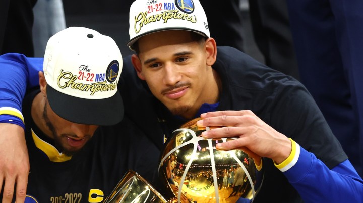 BOSTON, MASSACHUSETTS - JUNE 16: Gary Payton II #0 and Juan Toscano-Anderson #95 of the Golden State Warriors celebrate after defeating the Boston Celtics 103-90 in Game Six of the 2022 NBA Finals at TD Garden on June 16, 2022 in Boston, Massachusetts. NOTE TO USER: User expressly acknowledges and agrees that, by downloading and/or using this photograph, User is consenting to the terms and conditions of the Getty Images License Agreement. (Photo by Adam Glanzman/Getty Images)