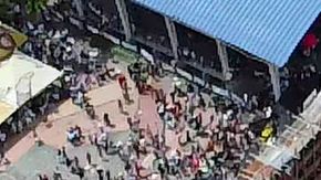 Aerial view of the collapsed grandstand in a bullring in the Colombian municipality of El Espinal, southwest of Bogotá, on June 26, 2022. - At least four people were killed and another 30 seriously injured when a full three-story section of wooden stands filled with spectators collapsed, throwing dozens of people to the ground, during a popular event at which members of the public face off with small bulls, officials said. (Photo by SAMUEL ANTONIO GALINDO CAMPOS / AFP) (Photo by SAMUEL ANTONIO GALINDO CAMPOS/AFP via Getty Images)