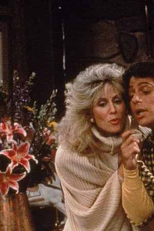 Actor Tony Danza eavesdrops as Judith Light speaks on the telephone, in a still from the TV series, 'Who's The Boss,' circa 1986. (Photo by ABC Television/Fotos International/Getty Images)