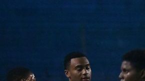 Dominican Republic's team members celebrate after winning the Concacaf U-20 World Cup quarterfinal football match against Jamaica at the Olimpico Metropolitano stadium in San Pedro Sula, Honduras, on June 29, 2022. (Photo by Orlando SIERRA / AFP) (Photo by ORLANDO SIERRA/AFP via Getty Images)