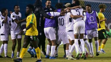 Dominican Republic's team members celebrate after winning the Concacaf U-20 World Cup quarterfinal football match against Jamaica at the Olimpico Metropolitano stadium in San Pedro Sula, Honduras, on June 29, 2022. (Photo by Orlando SIERRA / AFP) (Photo by ORLANDO SIERRA/AFP via Getty Images)