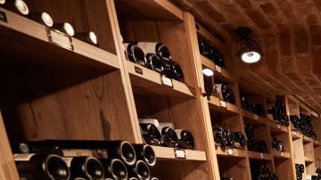 23 February 2022, Hamburg: Wine bottles stand and lie in the Vier Jahreszeiten wine cellar. The Hamburg luxury hotel "Vier Jahreszeiten" celebrates its 125th anniversary on 24.02.2022. Photo: Georg Wendt/dpa (Photo by Georg Wendt/picture alliance via Getty Images)