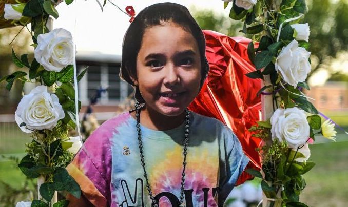 A photo of Alithia Ramirez, 10, who died in the mass shooting, is placed at a makeshift memorial at Robb Elementary School in Uvalde, Texas, on May 30, 2022. - Grieving families were to hold the first funerals Tuesday for Texas shooting victims one week after a school massacre left 19 children and two teachers dead, with President Joe Biden vowing to push for stricter US gun regulation.
Mourners attended wakes in the town of Uvalde on Monday for some of the child victims gunned down by a local 18-year-old man who was then killed by police. (Photo by CHANDAN KHANNA / AFP) (Photo by CHANDAN KHANNA/AFP via Getty Images)