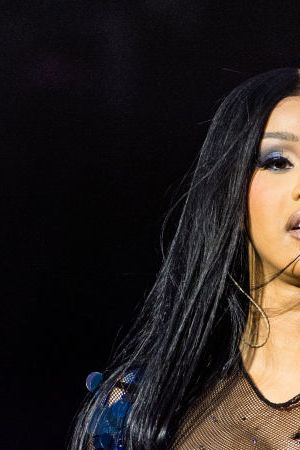 Cardi B performing on stage.