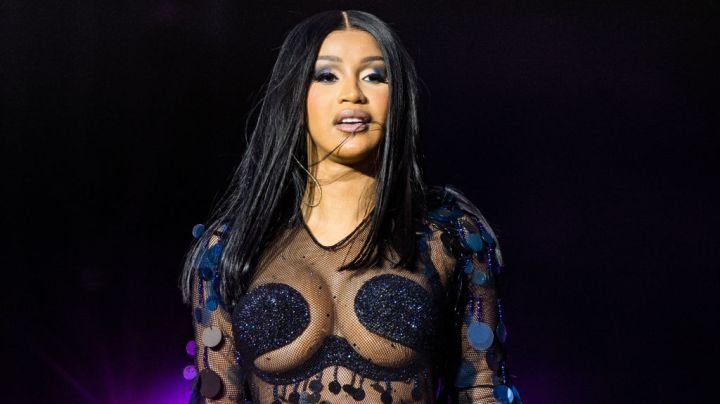 Cardi B performing on stage.
