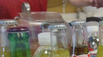 Bottled beverages are lined up for diners to choose from at Taqueria Los Gallos in Concord, Calif. on Tuesday, August 28, 2007.
PAUL CHINN/The Chronicle
Ran on: 09-06-2007
Diners, top, enjoy their meals at Taqueria Los Gallos in Concord, a restaurant specializing in seafood offerings. The ordering area, above, features bottles of beer, Mexican Pepsi and fruit sodas like Strawberry Crush and Jarritos in tamarind, pineapple and mandarin flavors.