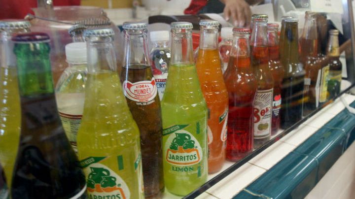 Bottled beverages are lined up for diners to choose from at Taqueria Los Gallos in Concord, Calif. on Tuesday, August 28, 2007.
PAUL CHINN/The Chronicle
Ran on: 09-06-2007
Diners, top, enjoy their meals at Taqueria Los Gallos in Concord, a restaurant specializing in seafood offerings. The ordering area, above, features bottles of beer, Mexican Pepsi and fruit sodas like Strawberry Crush and Jarritos in tamarind, pineapple and mandarin flavors.