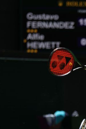 LONDON, ENGLAND - JULY 08: Gustavo Fernandez of Argentina plays a forehand against Alfie Hewett of Great Britain during their Wheelchair Singles Semi Final match on day twelve of The Championships Wimbledon 2022 at All England Lawn Tennis and Croquet Club on July 08, 2022 in London, England. (Photo by Julian Finney/Getty Images)