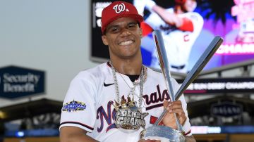 LOS ANGELES, CALIFORNIA - JULY 18: National League All-Star Juan Soto #22 of the Washington Nationals poses with the 2022 T-Mobile Home Run Derby trophy after winning the event at Dodger Stadium on July 18, 2022 in Los Angeles, California. (Photo by Kevork Djansezian/Getty Images)