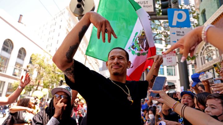 Power forward Juan Toscano Anderson greets fans during the 2022 NBA Champion Golden State Warriors Parade on Monday, June 20, 2022, in San Francisco, Calif. This is the WarriorsÕ fourth NBA Championship in eight years.