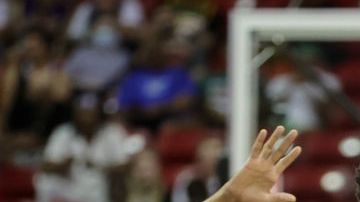 LAS VEGAS, NEVADA - JULY 11: Darius Days #38 of the San Antonio Spurs is congratulated by teammates Javin DeLaurier #40 and Jordan Hall #30 after Days hit a 3-pointer against the Houston Rockets during the 2022 NBA Summer League at the Thomas & Mack Center on July 11, 2022 in Las Vegas, Nevada. NOTE TO USER: User expressly acknowledges and agrees that, by downloading and or using this photograph, User is consenting to the terms and conditions of the Getty Images License Agreement. (Photo by Ethan Miller/Getty Images)