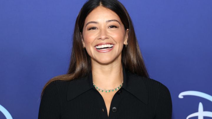 Gina Rodriguez on Disney red carpet.