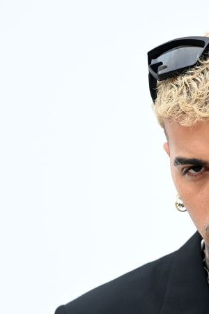 PARIS, FRANCE - JUNE 22: (EDITORIAL USE ONLY - For Non-Editorial use please seek approval from Fashion House) Rauw Alejandro attends the Givenchy Menswear Spring Summer 2023 show as part of Paris Fashion Week  on June 22, 2022 in Paris, France. (Photo by Pascal Le Segretain/Getty Images)