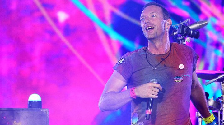 LONDON, ENGLAND - AUGUST 12: (EDITORIAL USE ONLY) Chris Martin of Coldplay performs on stage at Wembley Stadium during the 'Music of the Spheres' World Tour on August 12, 2022 in London, England. (Photo by Jim Dyson/Getty Images)