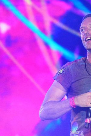 LONDON, ENGLAND - AUGUST 12: (EDITORIAL USE ONLY) Chris Martin of Coldplay performs on stage at Wembley Stadium during the 'Music of the Spheres' World Tour on August 12, 2022 in London, England. (Photo by Jim Dyson/Getty Images)