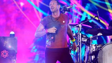 LONDON, ENGLAND - AUGUST 12: (EDITORIAL USE ONLY) Chris Martin of Coldplay performs on stage at Wembley Stadium during the 'Music of the Spheres' World Tour on August 12, 2022 in London, England. (Photo by Jim Dyson/Getty Images)