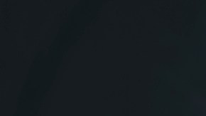 bodybuilder preparing a barbell on a power rack in gym, cologne, germany