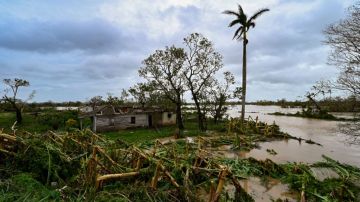 A damaged house is seen in San Juan y Martinez, Pinar del Rio Province, Cuba after the passage of Hurricane Ian, on September 27, 2022. - Powerful Hurricane Ian left a trail of destruction after battering western Cuba on Tuesday, while Florida battened down in preparation for a dangerous direct hit as the strengthening storm churns north. (Photo by ADALBERTO ROQUE / AFP) (Photo by ADALBERTO ROQUE/AFP via Getty Images)