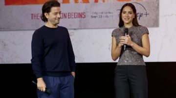 ANAHEIM, CALIFORNIA - SEPTEMBER 10: (L-R) Diego Luna and Adria Arjona speak onstage during D23 Expo 2022 at Anaheim Convention Center in Anaheim, California on September 10, 2022. (Photo by Jesse Grant/Getty Images for Disney)