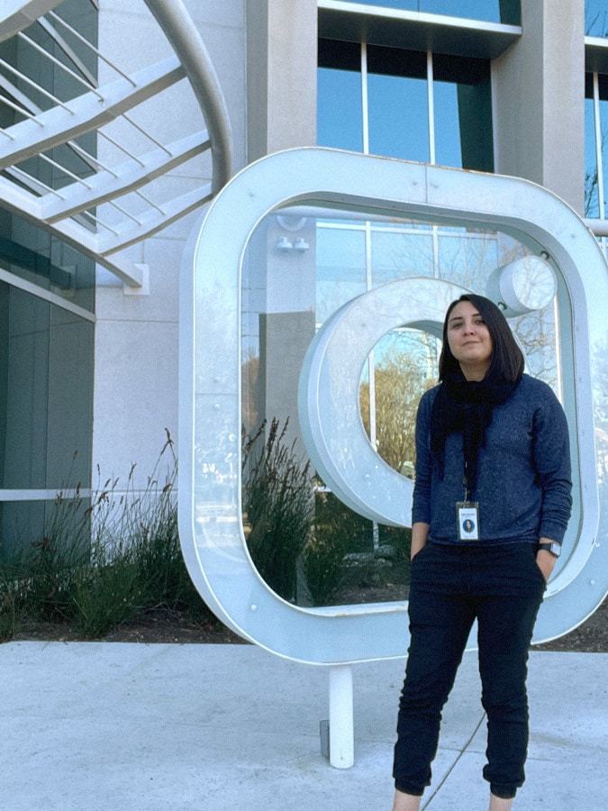 Photo of Diana Mendoza Ramirez in front of Instagram 