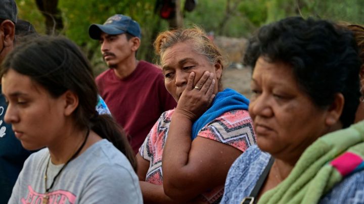 Relatives of the 10 miners trapped in a coal mine after a collapse more than a week, attend a press conference in the community of Agujita, Sabinas Municipality, Coahuila State, Mexico, on August 14, 2022. - The flooded mine where ten workers have been trapped for 11 days in northern Mexico registered an "abrupt increase in water levels," authorities reported on Sunday, which could complicate rescue efforts. (Photo by Pedro PARDO / AFP) (Photo by PEDRO PARDO/AFP via Getty Images)