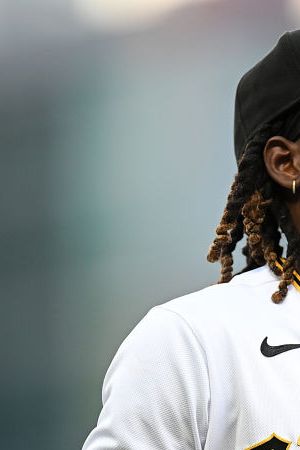 PITTSBURGH, PA - SEPTEMBER 02: Oneil Cruz #15 of the Pittsburgh Pirates is seen wearing a gold pin and wristband in honor of Childhood Cancer Awareness Day during the game against the Toronto Blue Jays at PNC Park on September 2, 2022 in Pittsburgh, Pennsylvania. (Photo by Joe Sargent/Getty Images)
