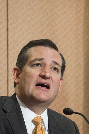 Republican Presidential hopeful and Texas Senator Ted Cruz (L) speaks alongside Texas Governor Greg Abbott about the Senate bill, "Terrorist Refugee Infiltration Prevention Act of 2015", which would prevent refugees into the US from Iraq, Syria or any country substantially controlled by a terrorist organization, during a press conference on Capitol Hill in Washington, DC, December 8, 2015. AFP PHOTO / SAUL LOEB / AFP / SAUL LOEB (Photo credit should read SAUL LOEB/AFP via Getty Images)