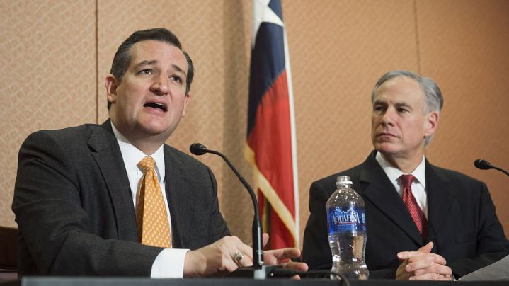 Republican Presidential hopeful and Texas Senator Ted Cruz (L) speaks alongside Texas Governor Greg Abbott about the Senate bill, "Terrorist Refugee Infiltration Prevention Act of 2015", which would prevent refugees into the US from Iraq, Syria or any country substantially controlled by a terrorist organization, during a press conference on Capitol Hill in Washington, DC, December 8, 2015. AFP PHOTO / SAUL LOEB / AFP / SAUL LOEB (Photo credit should read SAUL LOEB/AFP via Getty Images)