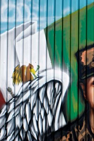 Candles and flowers decorate a makeshift memorial for US Army Specialist Vanessa Guillen at Power House Gym on August 14, 2020, in Houston, Texas. - Guillen's murder the subsequent suicide of the chief suspect, US Army specialist Aaron Robinson, has put a spotlight on sexual harassment in the US military. Guillen, a 20-year-old US Army specialist at Fort Hood in Texas, went missing more than two months ago. After a weeks-long search, a lawyer for the Guillen family confirmed that human remains found on June 30 near her former base were those of the missing soldier. (Photo by Mark Felix / AFP) (Photo by MARK FELIX/AFP /AFP via Getty Images)
