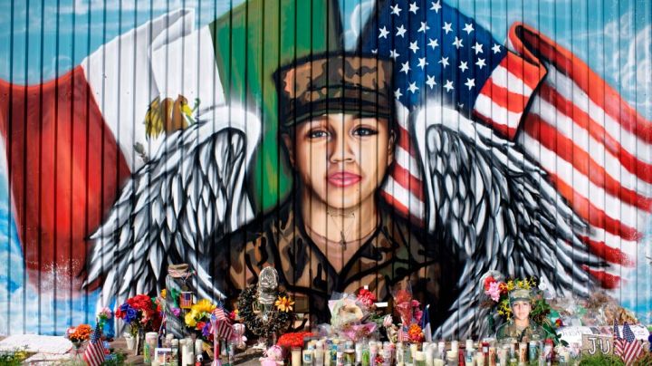 Candles and flowers decorate a makeshift memorial for US Army Specialist Vanessa Guillen at Power House Gym on August 14, 2020, in Houston, Texas. - Guillen's murder the subsequent suicide of the chief suspect, US Army specialist Aaron Robinson, has put a spotlight on sexual harassment in the US military. Guillen, a 20-year-old US Army specialist at Fort Hood in Texas, went missing more than two months ago. After a weeks-long search, a lawyer for the Guillen family confirmed that human remains found on June 30 near her former base were those of the missing soldier. (Photo by Mark Felix / AFP) (Photo by MARK FELIX/AFP /AFP via Getty Images)