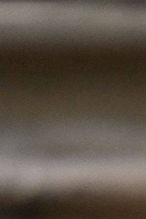 TOPSHOT - Paris Saint-Germain's Brazilian forward Neymar gestures as he leaves after attending a hearing at the courthouse in Barcelona on October 18, 2022, on the second day of his trial. - Brazil superstar Neymar said his manager father always handled his contracts as he took the stand at his trial over alleged irregularities in his transfer to Barcelona in 2013. He also said he did not remember if he took part in the negotiations which led to an agreement sealed in 2011 with Barcelona over his transfer two years later to the Catalan side from Brazilian club Santos. (Photo by Josep LAGO / AFP) (Photo by JOSEP LAGO/AFP via Getty Images)