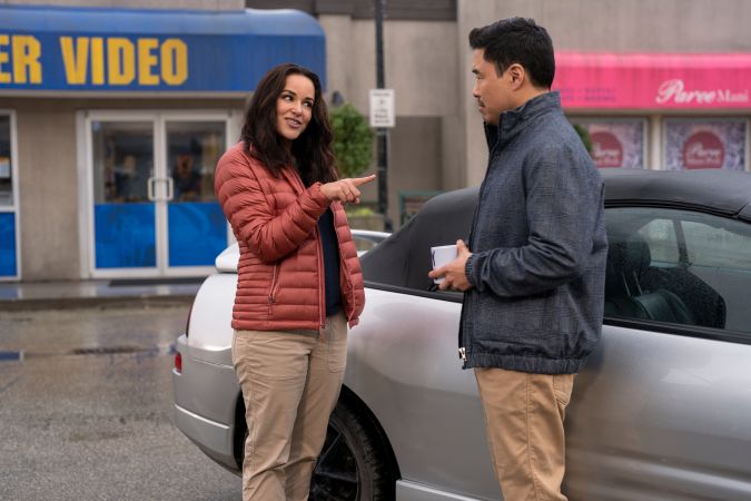 Blockbuster. (L to R) Melissa Fumero as Eliza, Randall Park as Timmy in episode 101 of Blockbuster. Cr. Ricardo Hubbs/Netflix © 2022