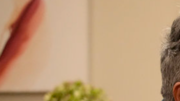 LOPEZ VS. LOPEZ -- "Pilot" Episode 101 -- Pictured: (l-r) George Lopez as George, Selenis Leyva as Rosie -- (Photo by: Casey Durkin/NBC)