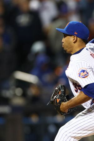 NEW YORK, NEW YORK - OCTOBER 08: Edwin Diaz #39 of the New York Mets delviers during the seventh inning against the San Diego Padres in game two of the Wild Card Series at Citi Field on October 08, 2022 in New York City. (Photo by Elsa/Getty Images)