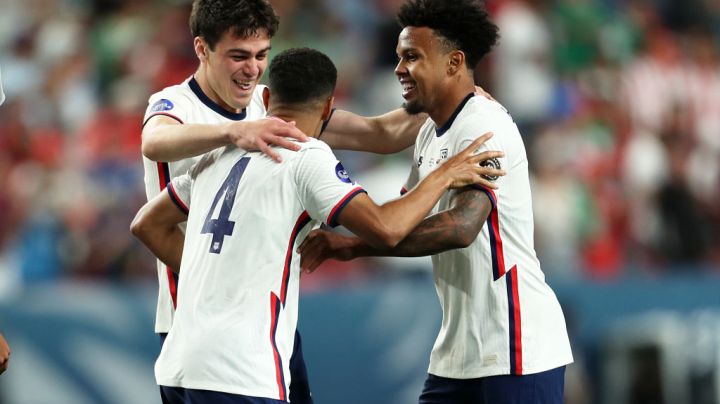 DENVER, CO - JUNE 06: Giovanni Reyna #7, Tyler Adams #4 and Weston McKennie #8 of United States celebrates after winning the CONCACAF Nations League Championship Final between United States and Mexico at Empower Field At Mile High on June 6, 2021 in Denver, Colorado. (Photo by Omar Vega/Getty Images)