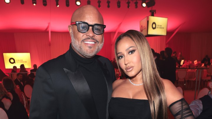 WEST HOLLYWOOD, CALIFORNIA - MARCH 27: (L-R) Israel Houghton and Adrienne Bailon attend the Elton John AIDS Foundation's 30th Annual Academy Awards Viewing Party on March 27, 2022 in West Hollywood, California. (Photo by Jamie McCarthy/Getty Images for Elton John AIDS Foundation )
