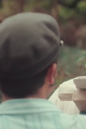 Claudio Arrendondo as Pablo Neruda in Ardiente Paciencia