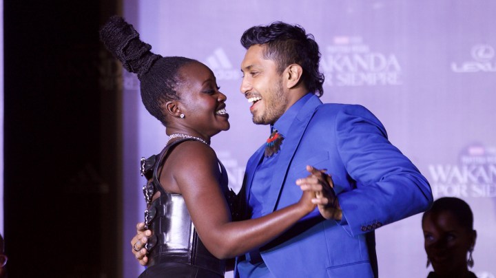 STATE OF MEXICO, MEXICO . NOVEMBER 9: Lupita Nyongo and Tenoch Huerta dance during the Black Panther: Wakanda Forever Fan Event at Plaza Satelite. On November 9, 2022 in State of Mexico, Mexico. (Photo credit should read Julian Lopez/ Eyepix Group/Future Publishing via Getty Images)