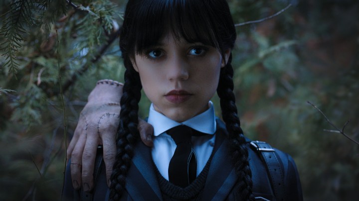 Wednesday. (L to R) Thing, Jenna Ortega as Wednesday Addams in episode 104 of Wednesday. Cr. Courtesy of Netflix © 2022