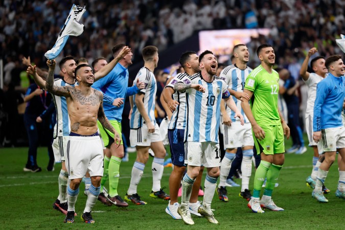 LUSAIL CITY, QATAR - DECEMBER 18: Lionel Messi of Argentina and team celebrate after winning the FIFA World Cup Qatar 2022 Final match between Argentina and France at Lusail Stadium on December 18, 2022 in Lusail City, Qatar. (Photo by Richard Sellers/Getty Images)