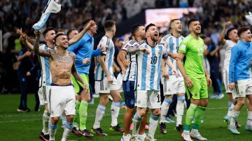 LUSAIL CITY, QATAR - DECEMBER 18: Lionel Messi of Argentina and team celebrate after winning the FIFA World Cup Qatar 2022 Final match between Argentina and France at Lusail Stadium on December 18, 2022 in Lusail City, Qatar. (Photo by Richard Sellers/Getty Images)