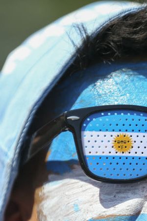 BUENOS AIRES, ARGENTINA - DECEMBER 13: Argentines celebrate victory as Argentina qualified for 2022 FIFA World Cup final after beating Croatia during the FIFA World Cup Qatar 2022 Semi-Final match between Argentina and Croatia in Buenos Aires, Argentina on December 13, 2022. (Photo by Muhammed Emin Canik/Anadolu Agency via Getty Images)