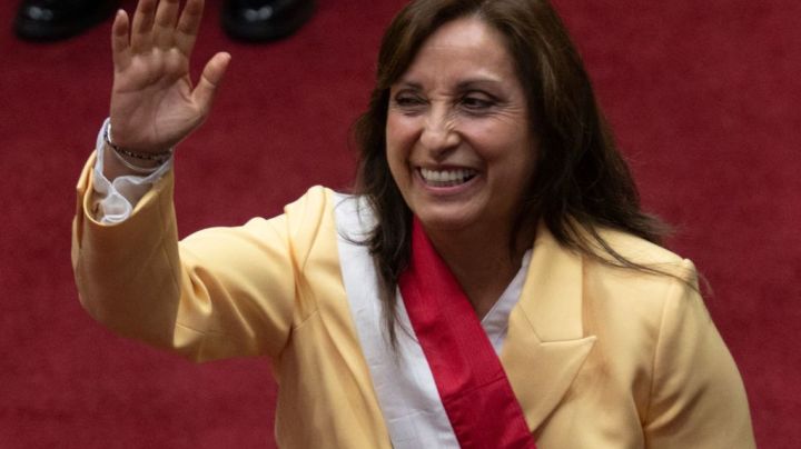 Peruvian Dina Boluarte greets members of the Congress after being sworn in as the new President hours after former President Pedro Castillo was impeached in Lima, on December 7, 2022. - Peru's Pedro Castillo was impeached and replaced as president by his deputy on Wednesday in a dizzying series of events in the country that has long been prone to political upheaval. Dina Boluarte, a 60-year-old lawyer, was sworn in as Peru's first female president just hours after Castillo tried to wrest control of the legislature in a move criticised as an attempted coup. (Photo by Cris BOURONCLE / AFP) (Photo by CRIS BOURONCLE/AFP via Getty Images)