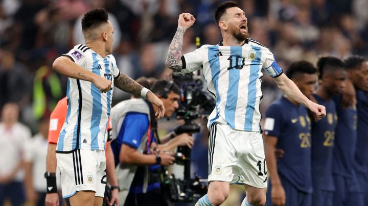 LUSAIL CITY, QATAR - DECEMBER 18: Lionel Messi of Argentina celebrates with teammates in the penalty shootout during the FIFA World Cup Qatar 2022 Final match between Argentina and France at Lusail Stadium on December 18, 2022 in Lusail City, Qatar. (Photo by Catherine Ivill/Getty Images)