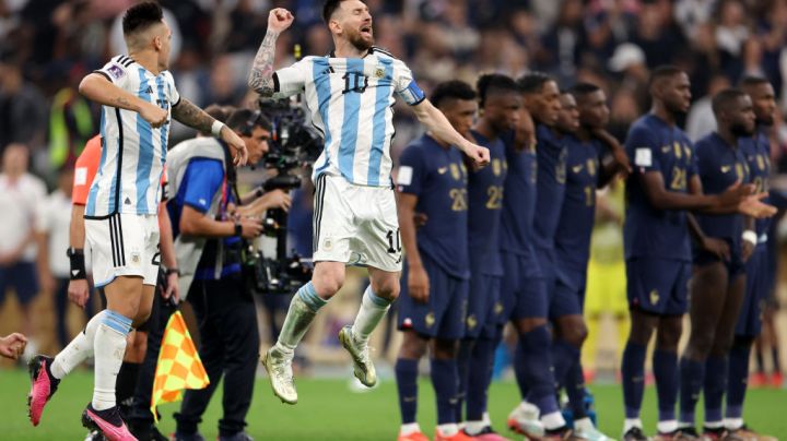 LUSAIL CITY, QATAR - DECEMBER 18: Lionel Messi of Argentina celebrates with teammates in the penalty shootout during the FIFA World Cup Qatar 2022 Final match between Argentina and France at Lusail Stadium on December 18, 2022 in Lusail City, Qatar. (Photo by Catherine Ivill/Getty Images)