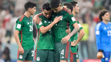 TOPSHOT - Mexico's midfielder #08 Carlos Rodriguez (L) and Mexico's midfielder #04 Edson Alvarez (R) react after the Qatar 2022 World Cup Group C football match between Saudi Arabia and Mexico at the Lusail Stadium in Lusail, north of Doha on November 30, 2022. (Photo by Alfredo ESTRELLA / AFP) (Photo by ALFREDO ESTRELLA/AFP via Getty Images)