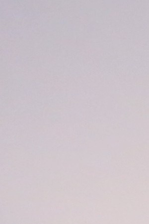 MIAMI, FLORIDA - DECEMBER 03: Puerto Rican artist Daniel Lind-Ramos poses with his assemblage titled "Wardrobe of Conscience, 2013" at the VIP preview of the 2018 PRIZM Art Fair in the Dupont Building on December 3, 2018 in Miami, Florida. (Photo by Sean Drakes/Getty Images)