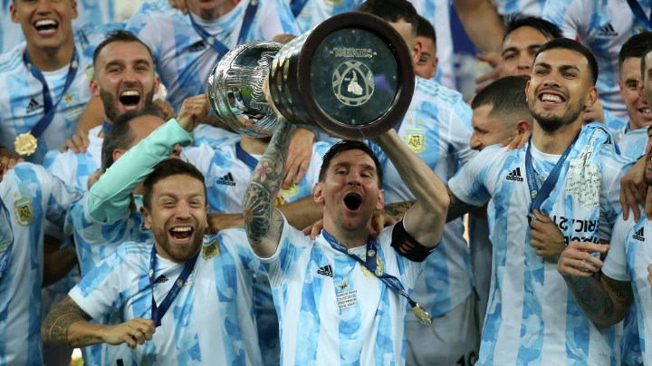 RIO DE JANEIRO, BRAZIL - JULY 10: Lionel Messi of Argentina lifts the trophy with teammates after winning the final of Copa América Brazil 2021 between Brazil and Argentina at Maracana Stadium on July 10, 2021 in Rio de Janeiro, Brazil. (Photo by Alexandre Schneider/Getty Images)